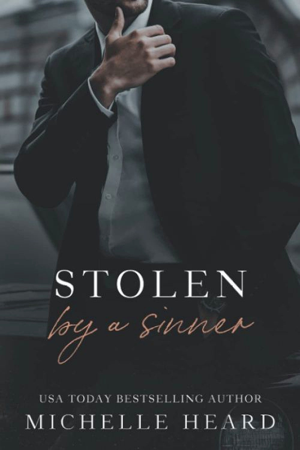 Stolen by a Sinner by Michelle Heard